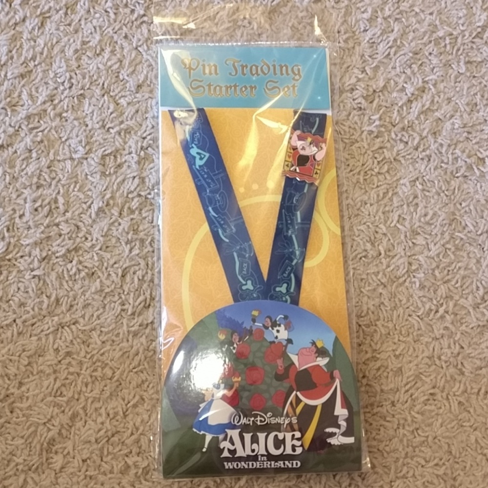 Disney alice pin lanyard and queen of hearts pin